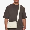 ESSENTIALS SHOULDER BAG CREAM