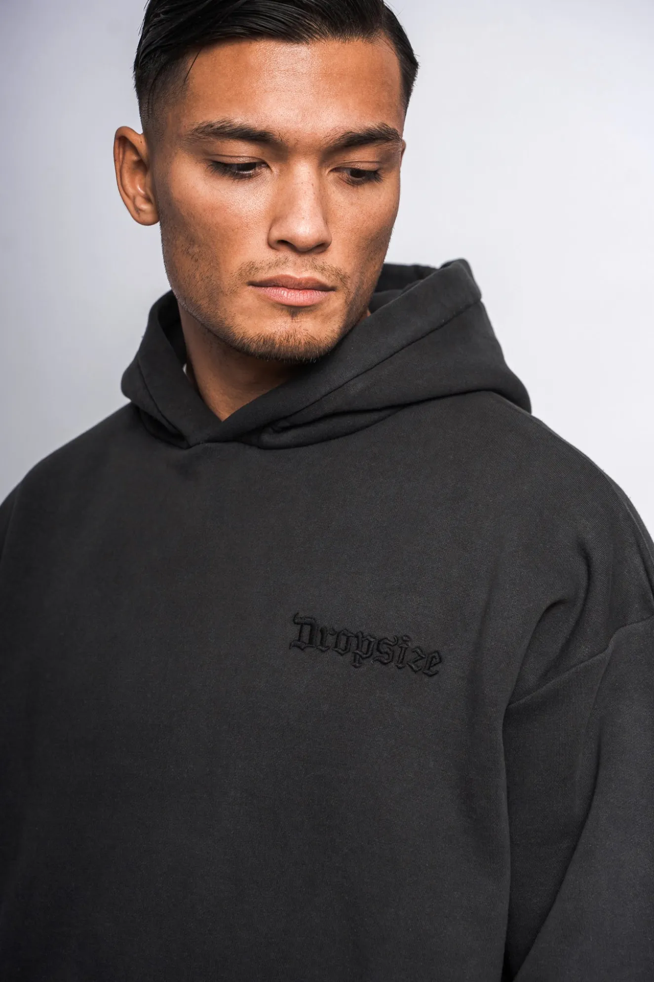 HEAVY OVERSIZE EMBO HOODIE ACID WASHED BLACK